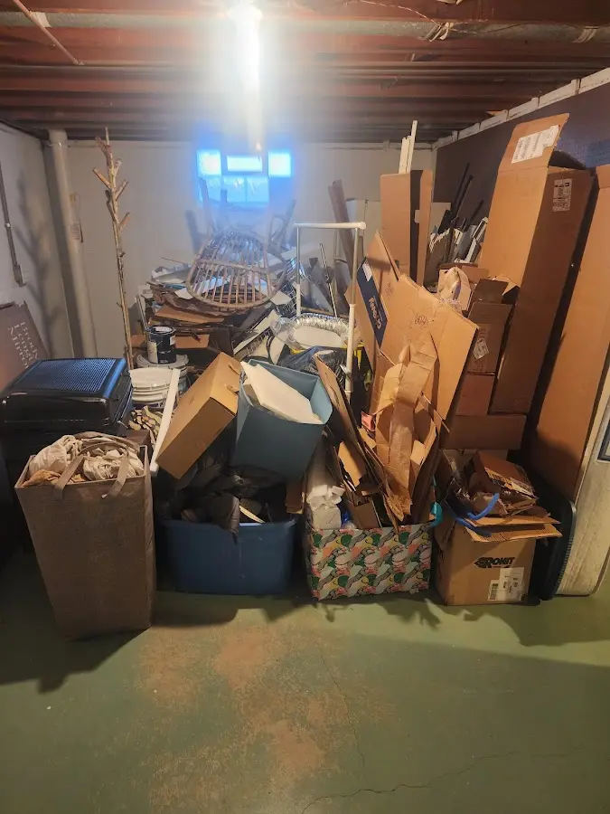 Roll-off dumpster container at job site for 20 Yard Dumpster Rental in Windham